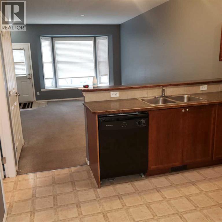 604, 2066 Luxstone Boulevard SW, Luxstone, Airdrie photo 4