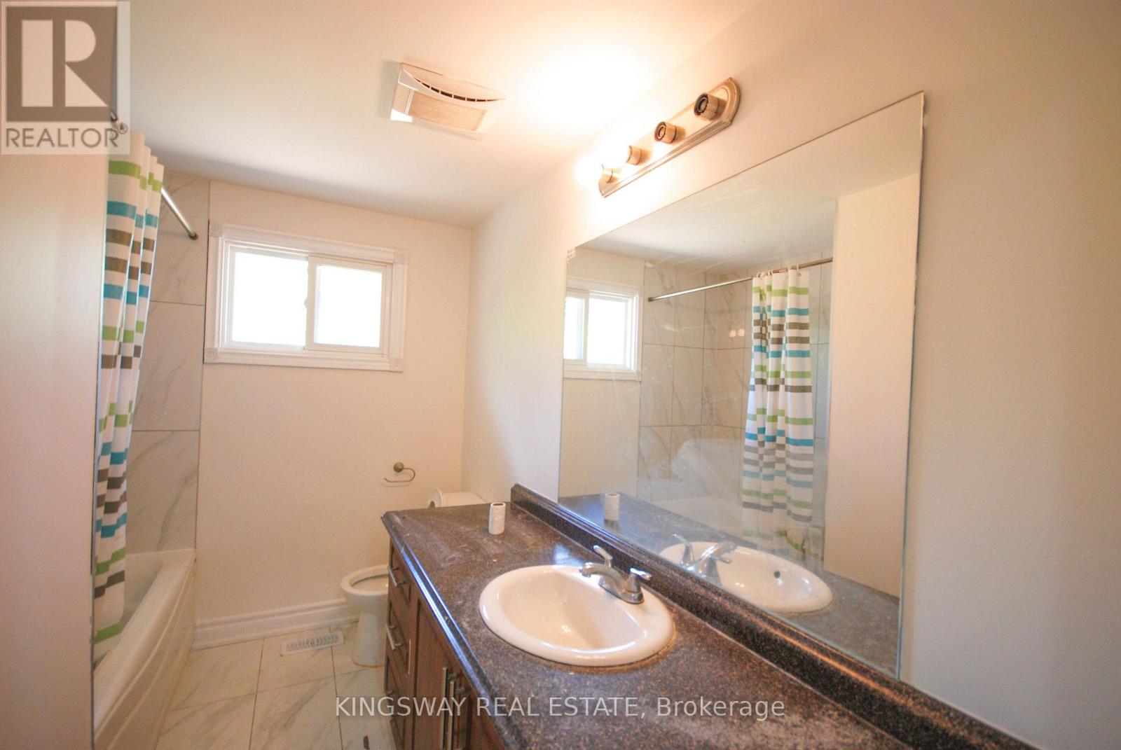 24 ARCHDEKIN DRIVE - 16