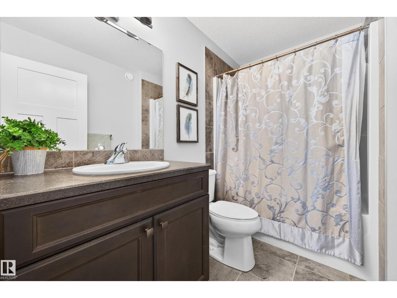 3306 HILTON CR NW - 33