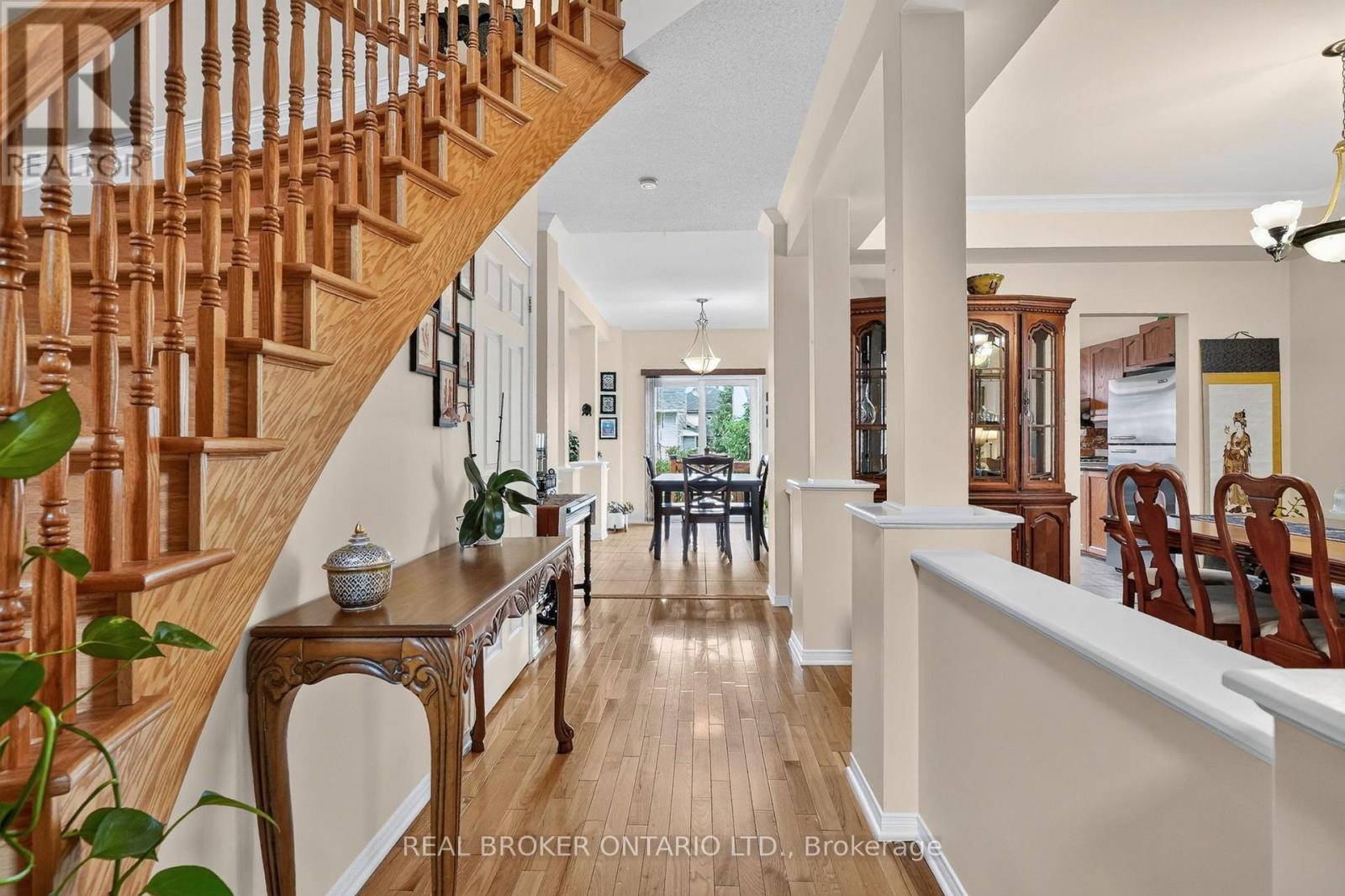 Sweeping hardwood floors throughout main level