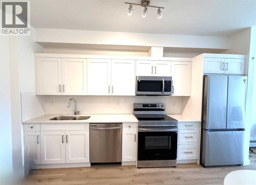 #106 70 Sage Hill Walk NW - 14