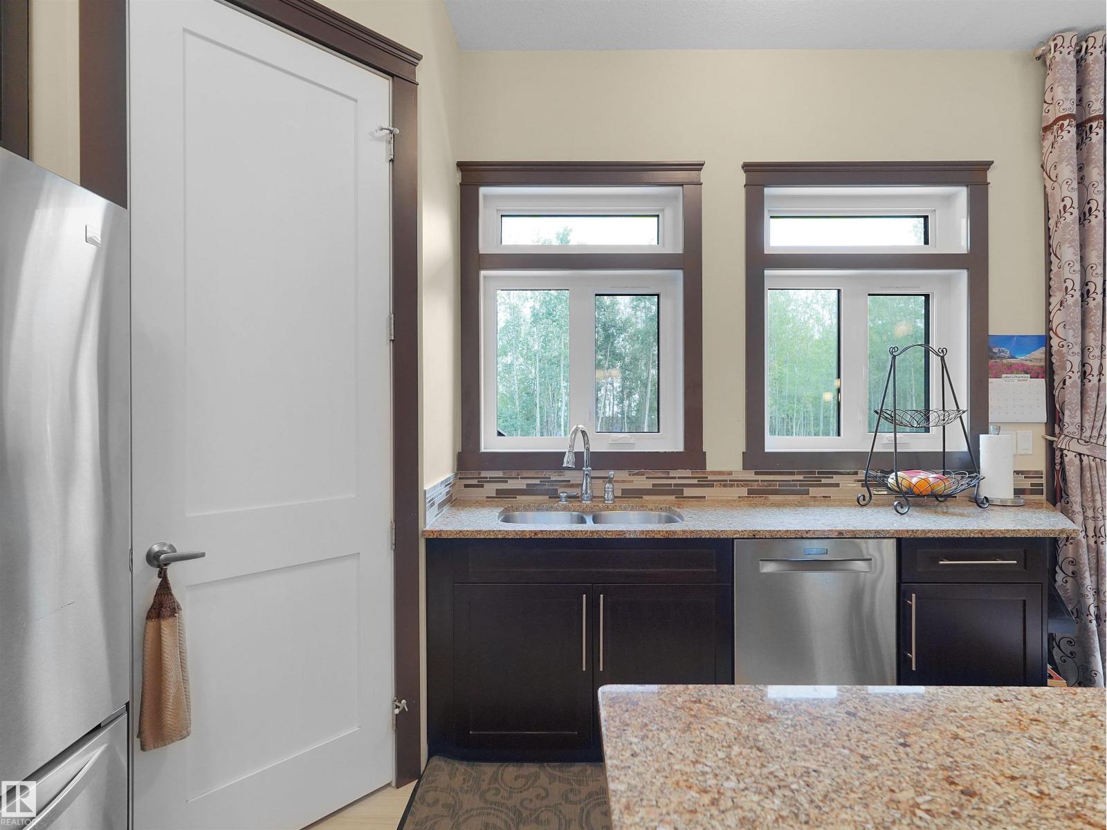 #128 462054 RGE ROAD 11 - 16
