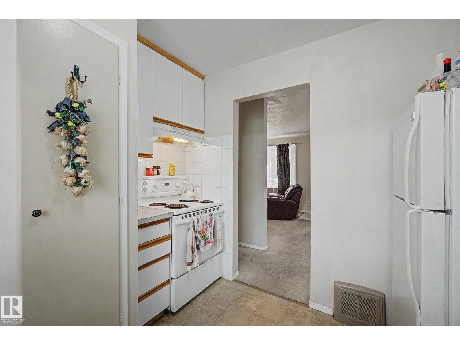 8710 83 AV NW - 7