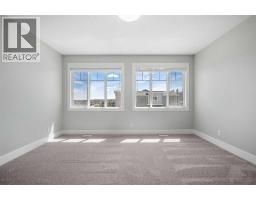 Primary Bedroom - 107 Sage Bluff Green Nw, Calgary, AB T3R0X9 Photo 11
