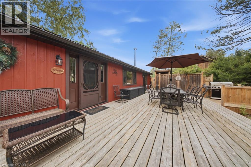 Expansive wooden deck with a privacy fence