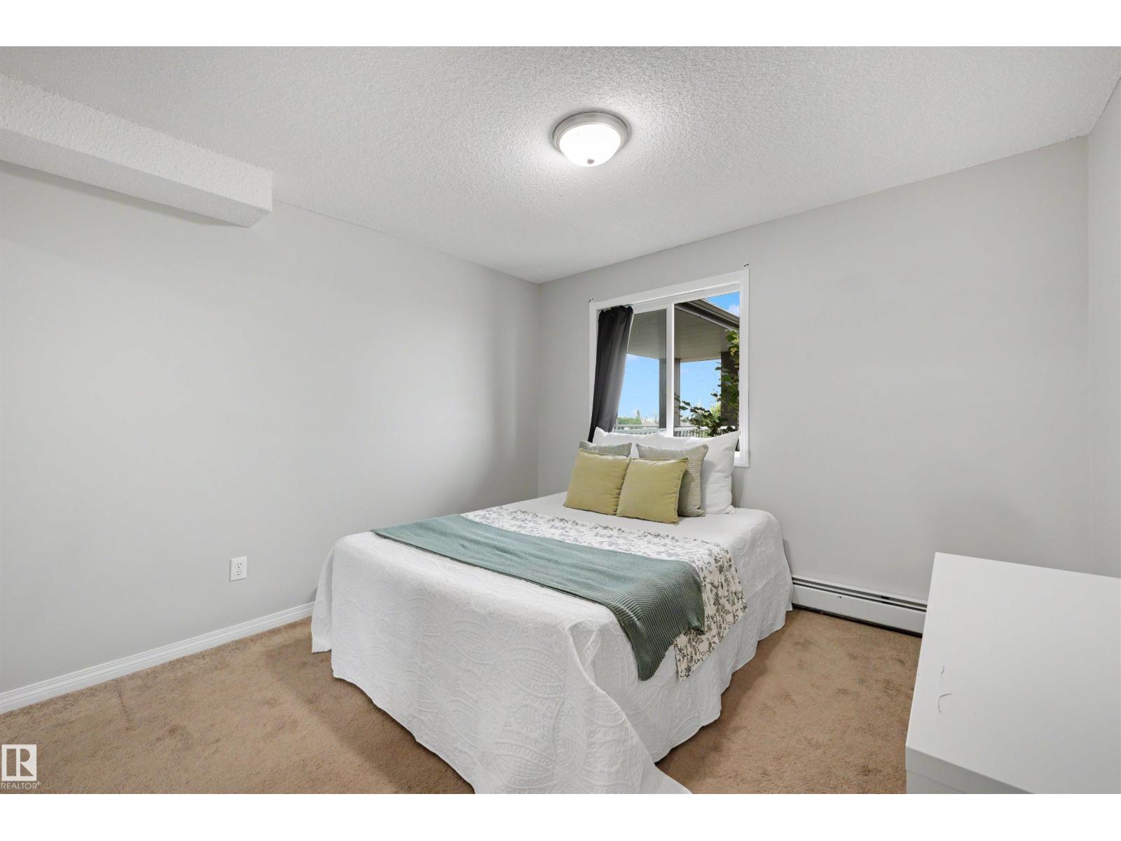 #427 3425 19 ST NW - 18