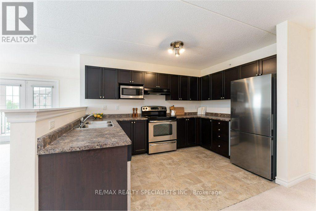 #313 1340 MAIN STREET E - 7