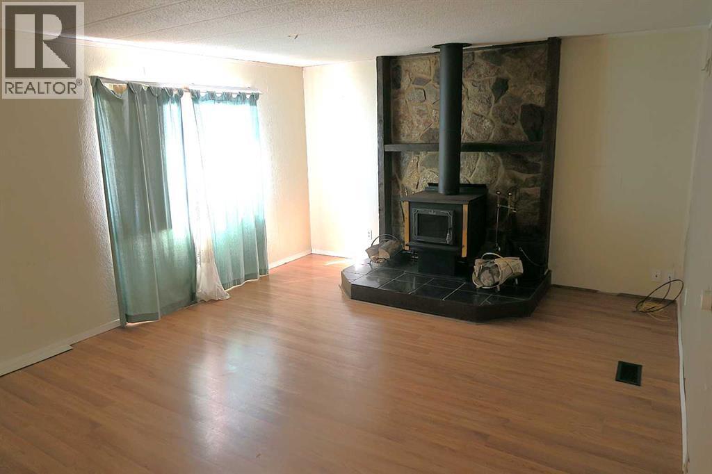 Big Livingroom with free standing enclosed fireplace