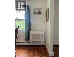 Living room/Fireplace - 949 East West Rd, Pelee Island, ON N0R1M0 Photo 12