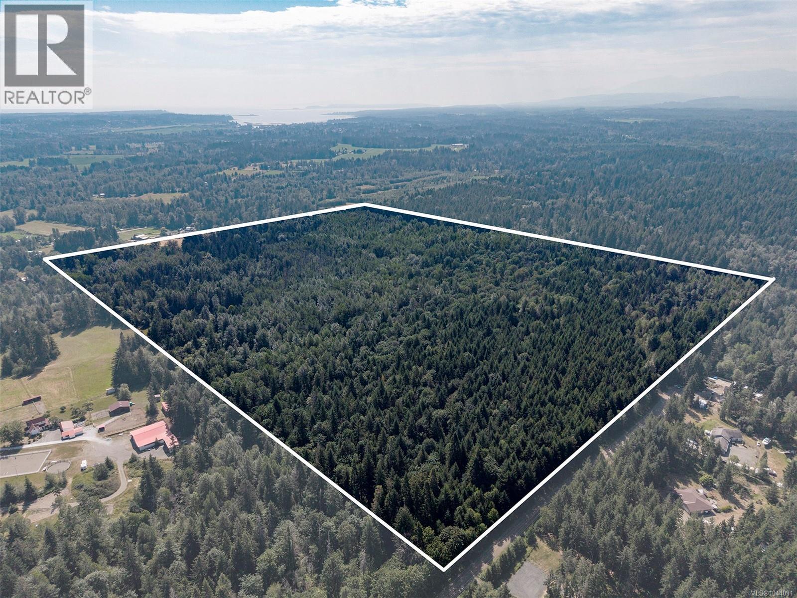 Lot lines approximate. Lot size taken from assessment. Survey pins visible on property and adjacent properties.