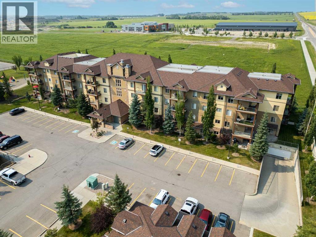 4203, 92 Crystal Shores Road, Crystal Shores, Okotoks photo 1