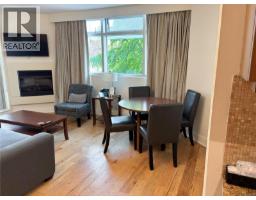 Living room - A209 810 Humboldt St, Victoria, BC V8V5B1 Photo 7