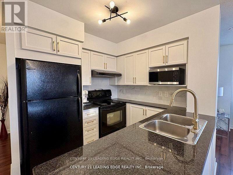 #712 18 KENASTON GARDENS - 4