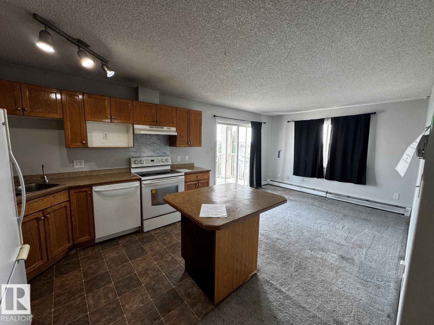 #428 2305 35A AV NW, Wild Rose, Edmonton photo 2