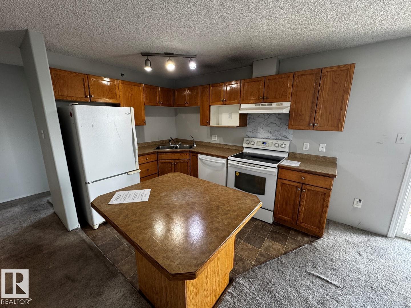 #428 2305 35A AV NW, Wild Rose, Edmonton photo 3