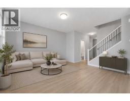 Bedroom - 603, 201 Cooperswood Green Sw, Airdrie, AB T3B3Y6 Photo 7