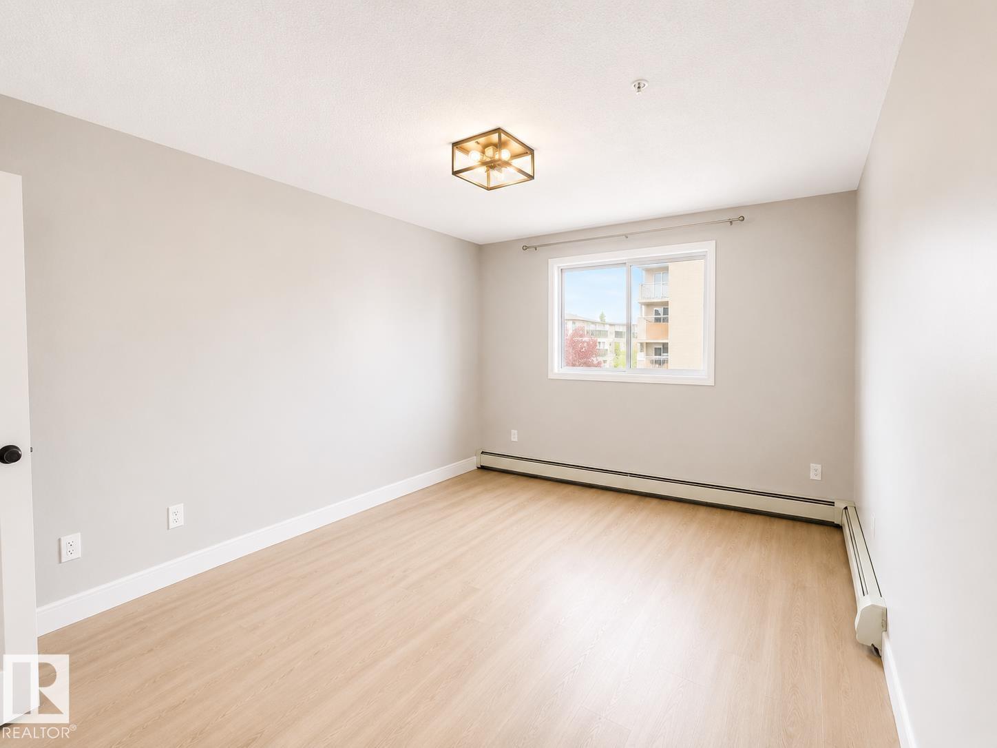 #329 17447 98A AV NW - 10