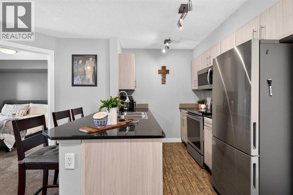 2403, 403 Mackenzie Way SW, Downtown, Airdrie photo 2
