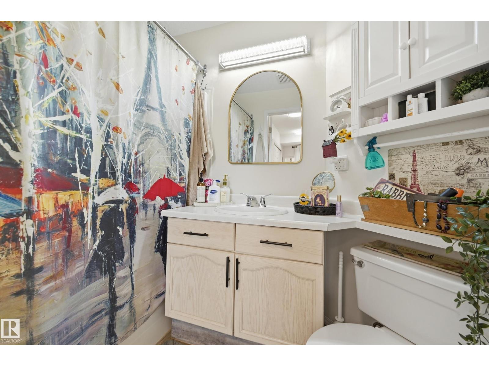 #208 9760 176 ST NW - 18