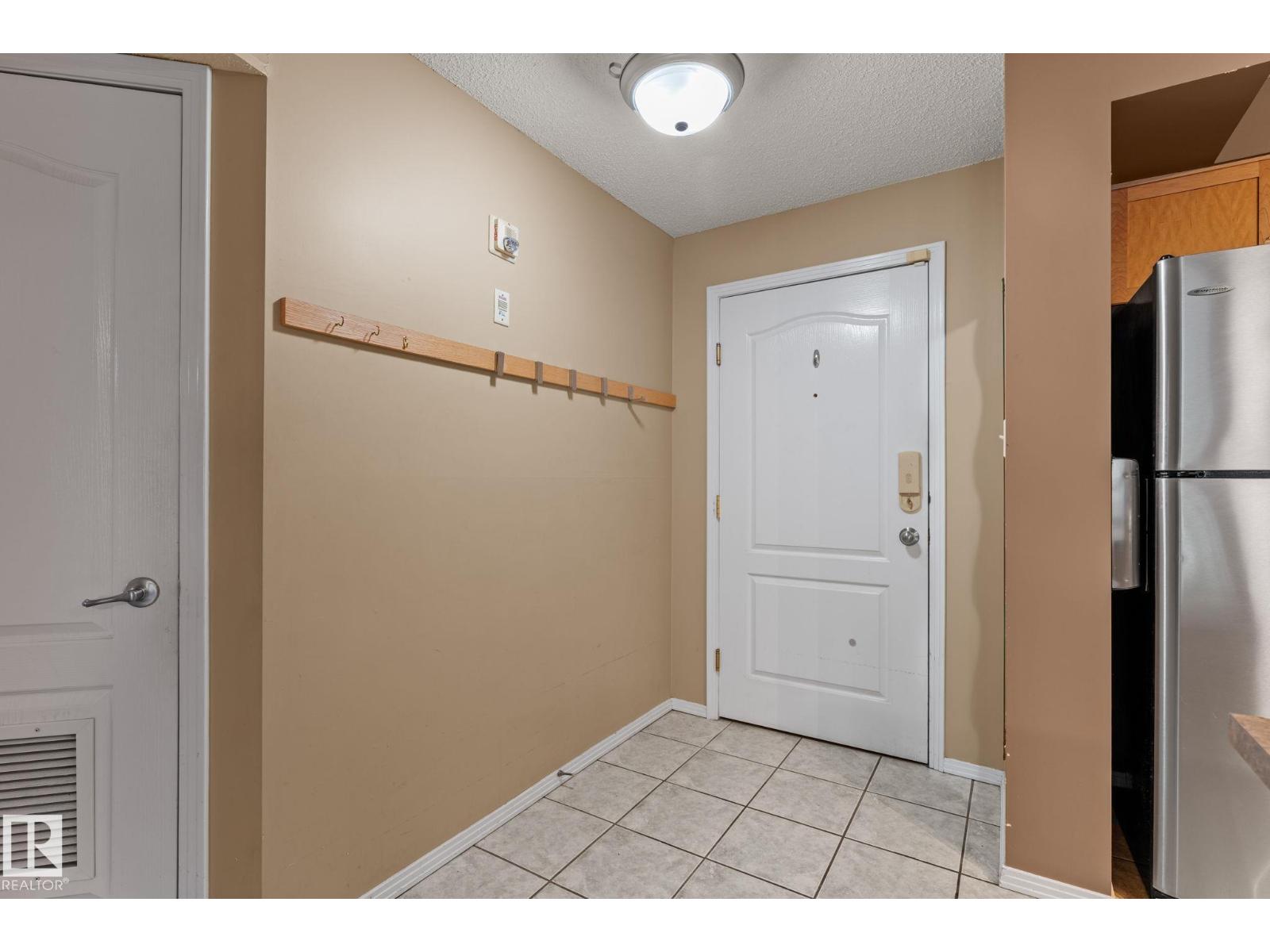 #203 8909 100 ST NW - 8