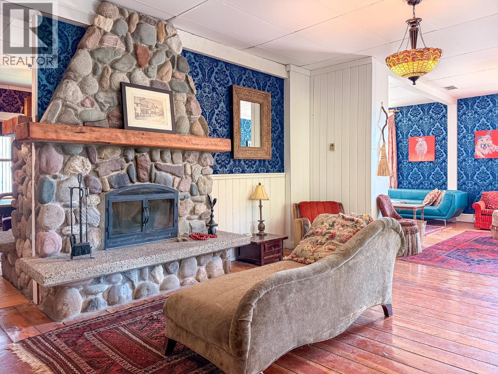 Grand parlour side of the double-sided stone fireplace