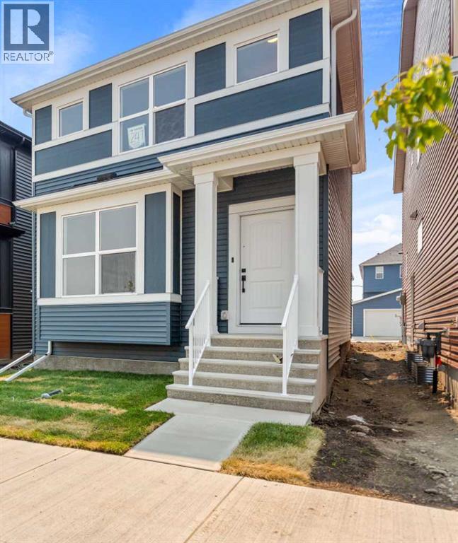 247 Lucas Gate NW, Livingston, Calgary photo 2