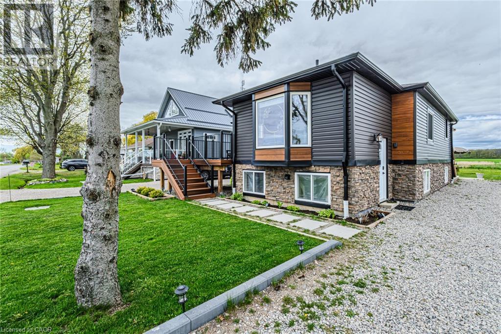 Great curb appeal with new vinyl siding and front porch. Driveway has parking for 8 cars
