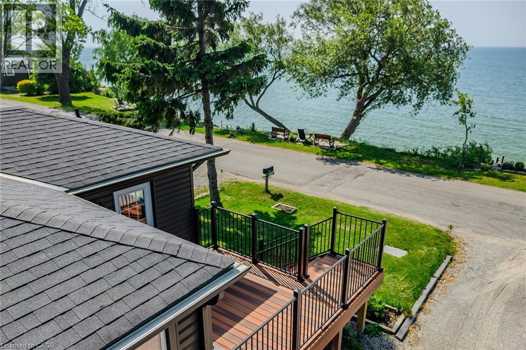 Birds eye view of new deck, eavestroughs, gutter guards, and that amazing view of the lake!