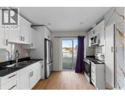 Family room - 410 P Avenue N, Saskatoon, SK S7L2V9 Photo 8