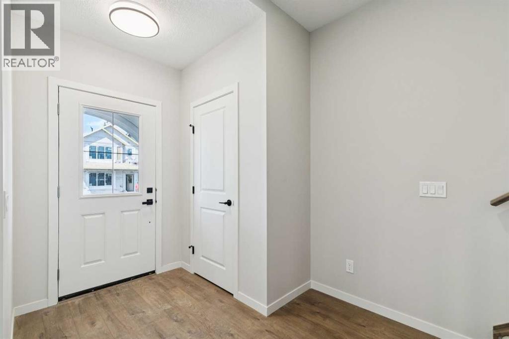 78 Bluerock Hill SW, Alpine Park, Calgary photo 3