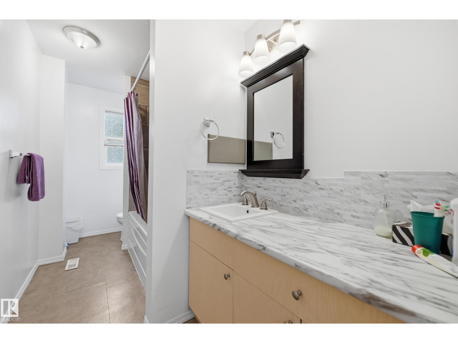 10714 103 ST NW - 12