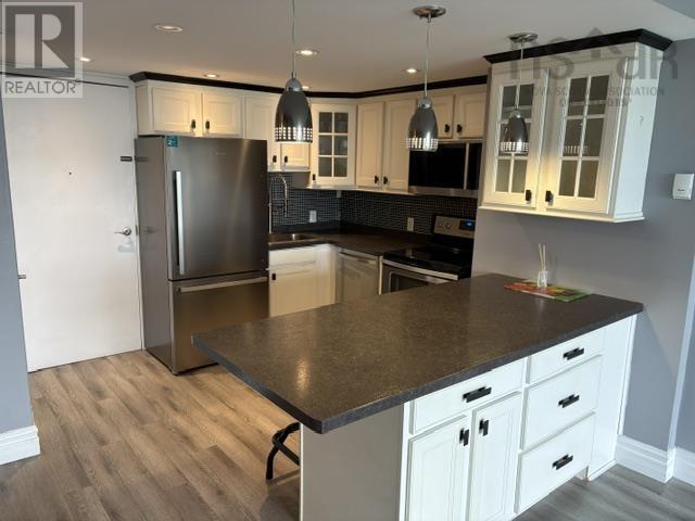 #1207 6369 Coburg Road - 1