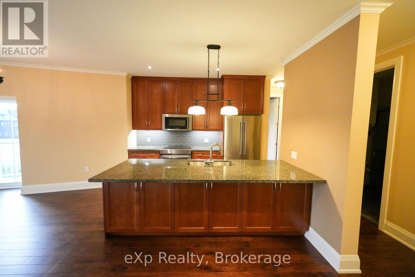 #203 80 9TH STREET E - 21