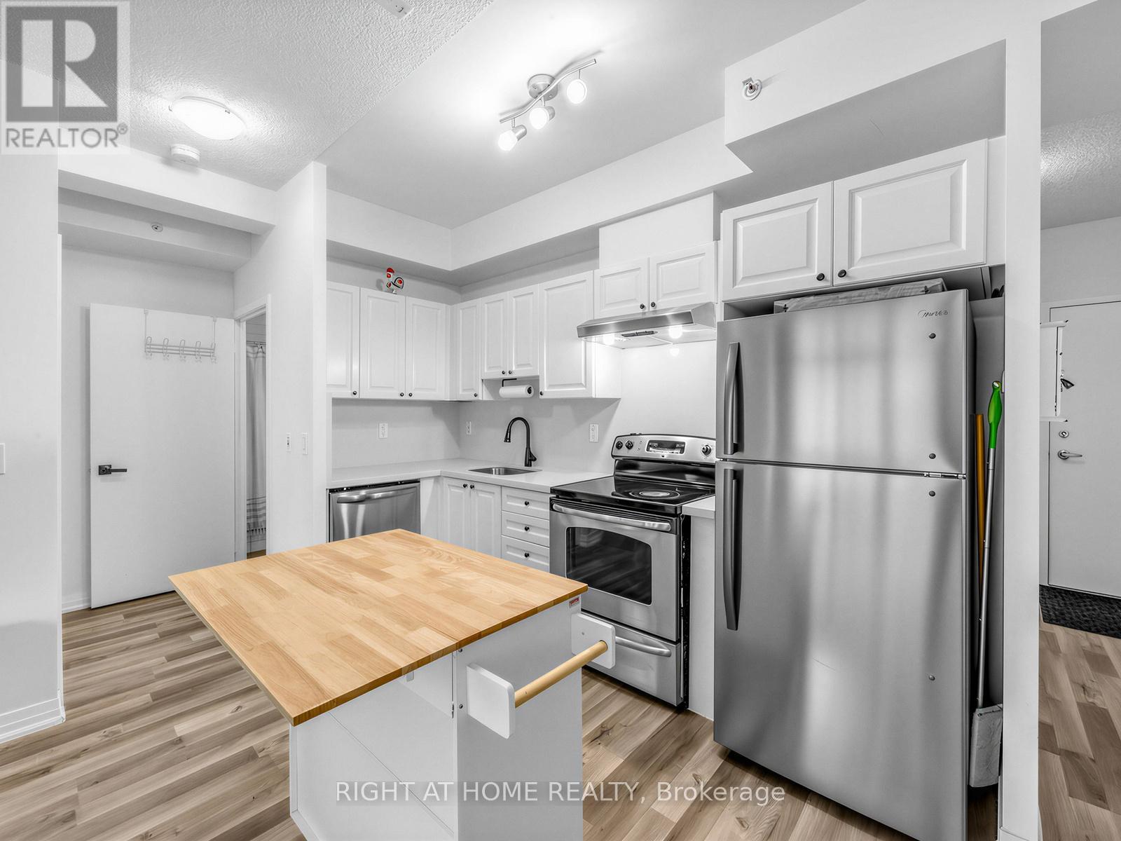 #208 155 LEGION ROAD N - 11
