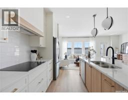 Laundry room - 24 720 Brighton Boulevard, Saskatoon, SK S7V1X1 Photo 12