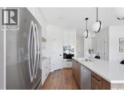 Laundry room - 22 720 Brighton Boulevard, Saskatoon, SK S7V1X1 Photo 8