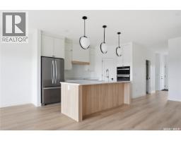 Laundry room - 20 720 Brighton Boulevard, Saskatoon, SK S7V1X1 Photo 10