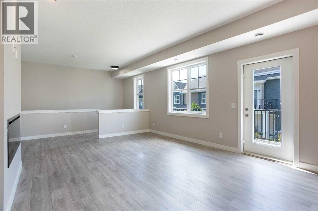 607 Cranbrook Walk SE, Cranston, Calgary photo 2