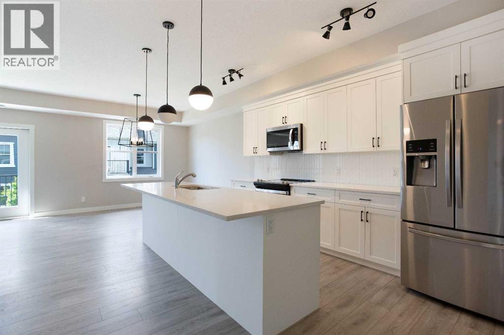 607 Cranbrook Walk SE, Cranston, Calgary photo 5