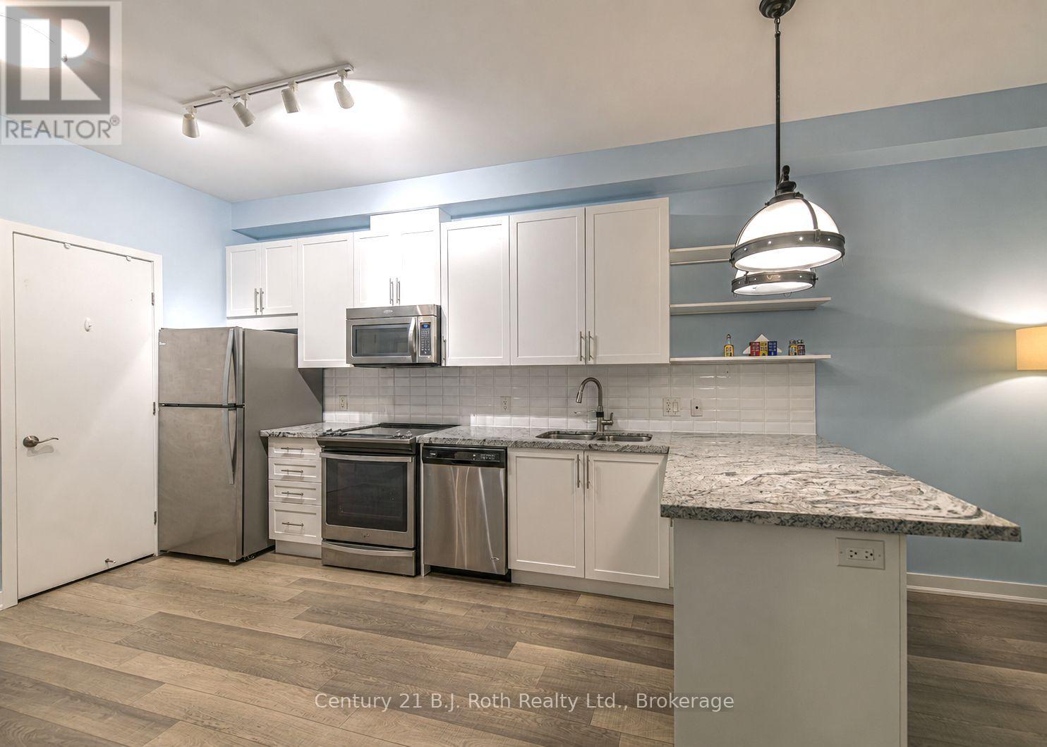 #SUITE 206 40 HORSESHOE BOULEVARD - 8