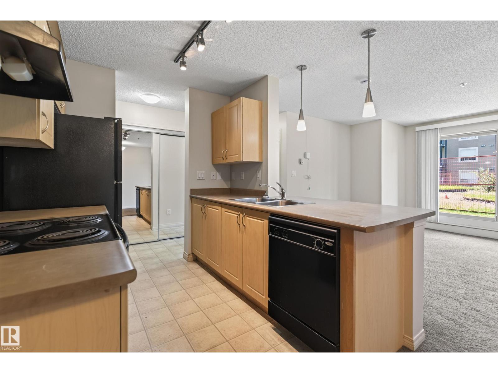 #104 13907 136 ST NW - 10