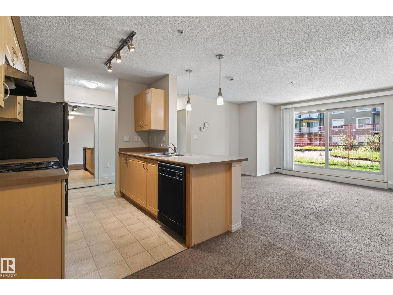 #104 13907 136 ST NW - 11