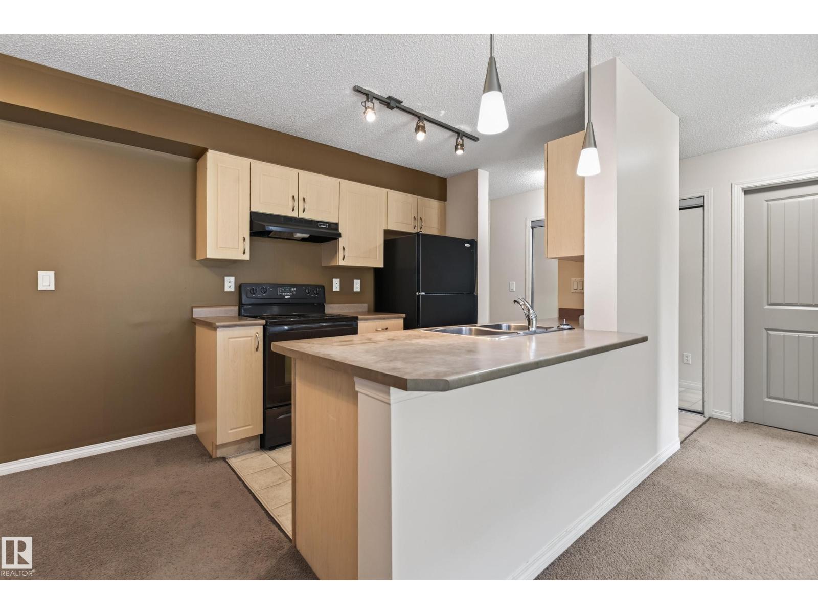 #104 13907 136 ST NW - 7