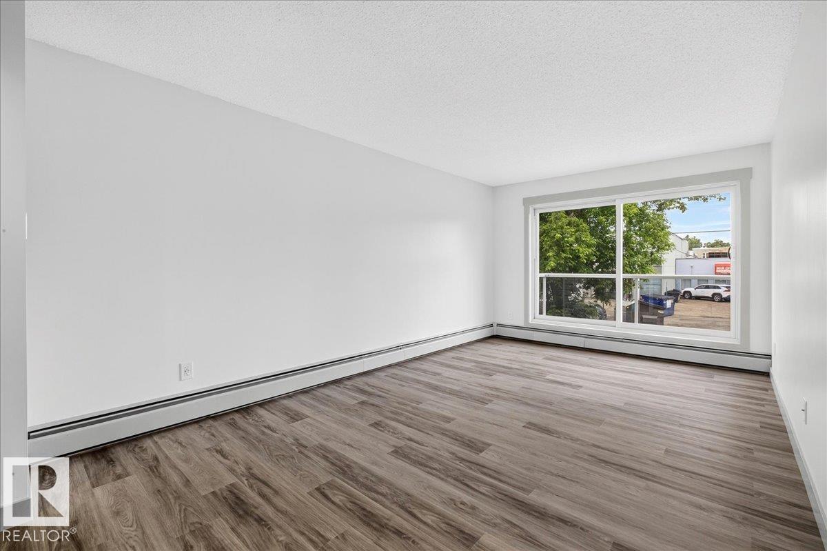 #203 10624 123 ST NW - 12