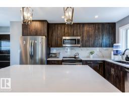 Laundry room - 9526 109a Av Nw, Edmonton, AB T5H1G3 Photo 7
