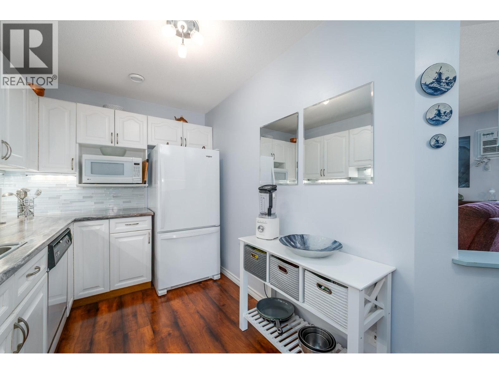 #103 878 Bernard Avenue - 23