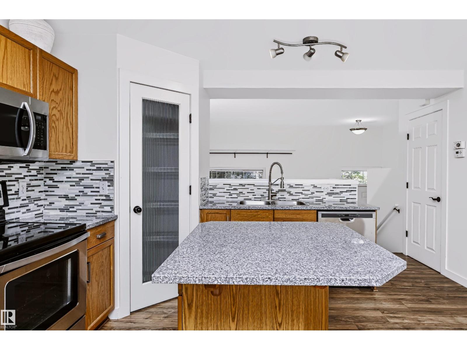 #66 8304 11 AV SW - 18