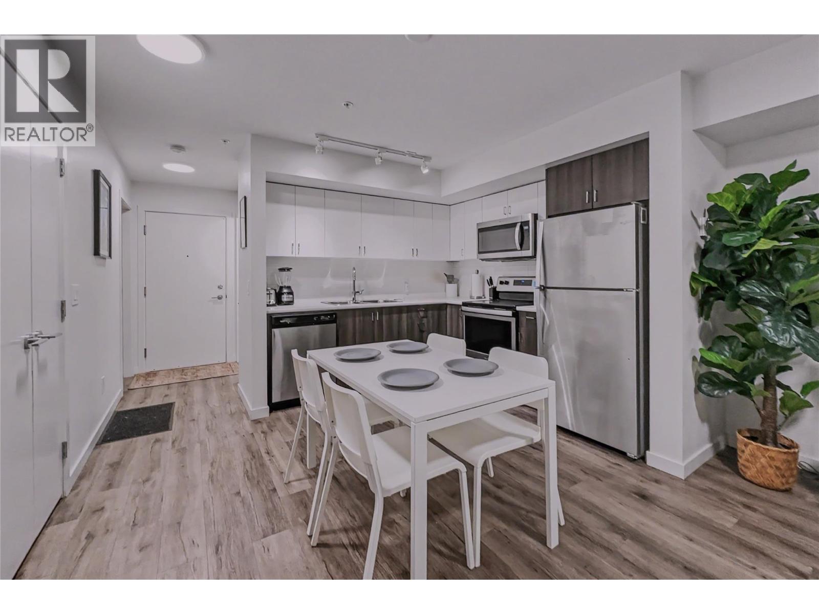 #115 725 Academy Way - 1