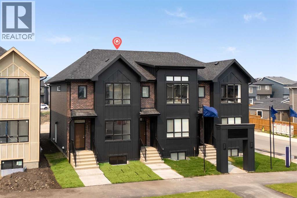 21523 Sheriff King Street SW, Pine Creek, Calgary photo 2