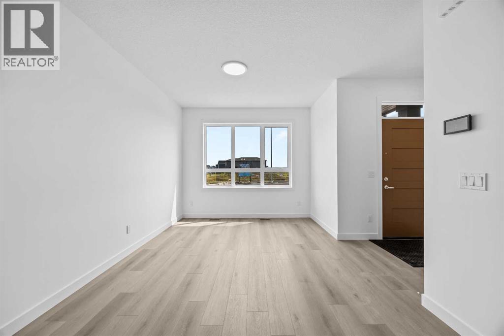 21523 Sheriff King Street SW, Pine Creek, Calgary photo 5